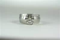 Custom Platinum and Hidden Diamond Ring